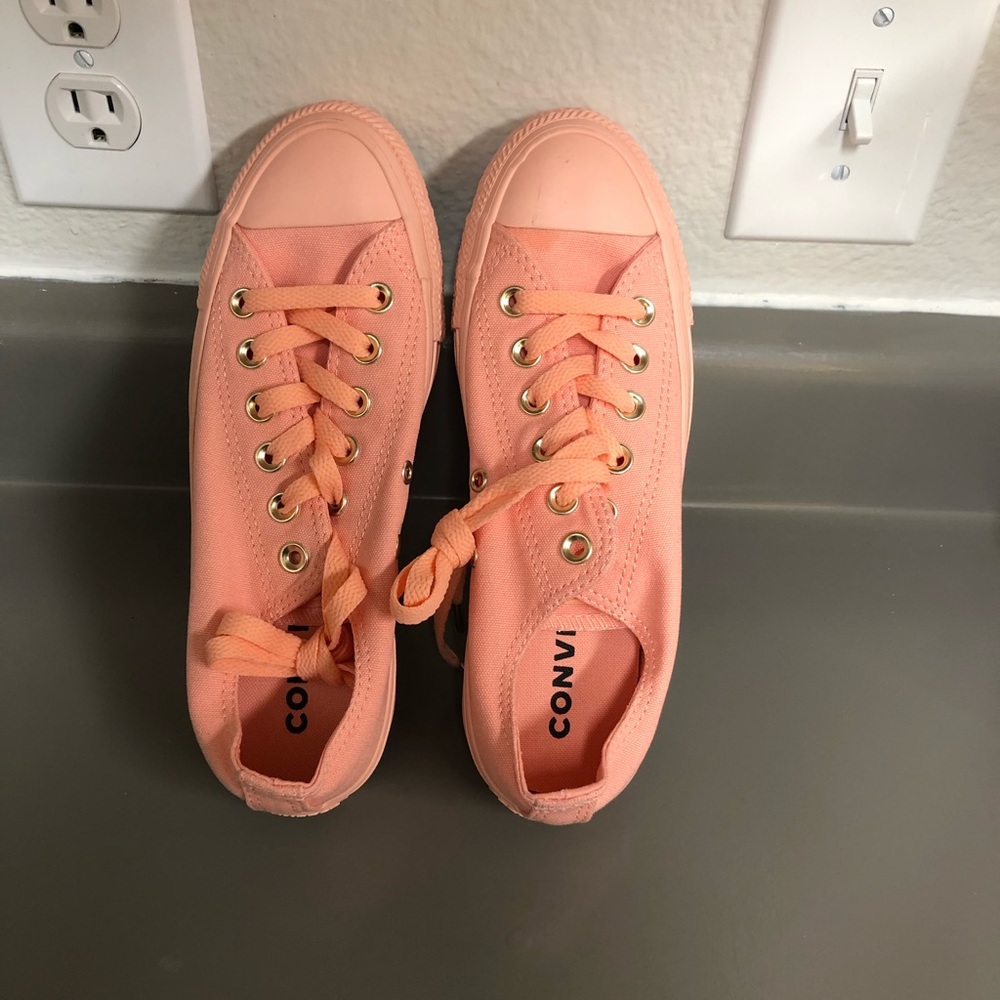 Peach women’s low top converse